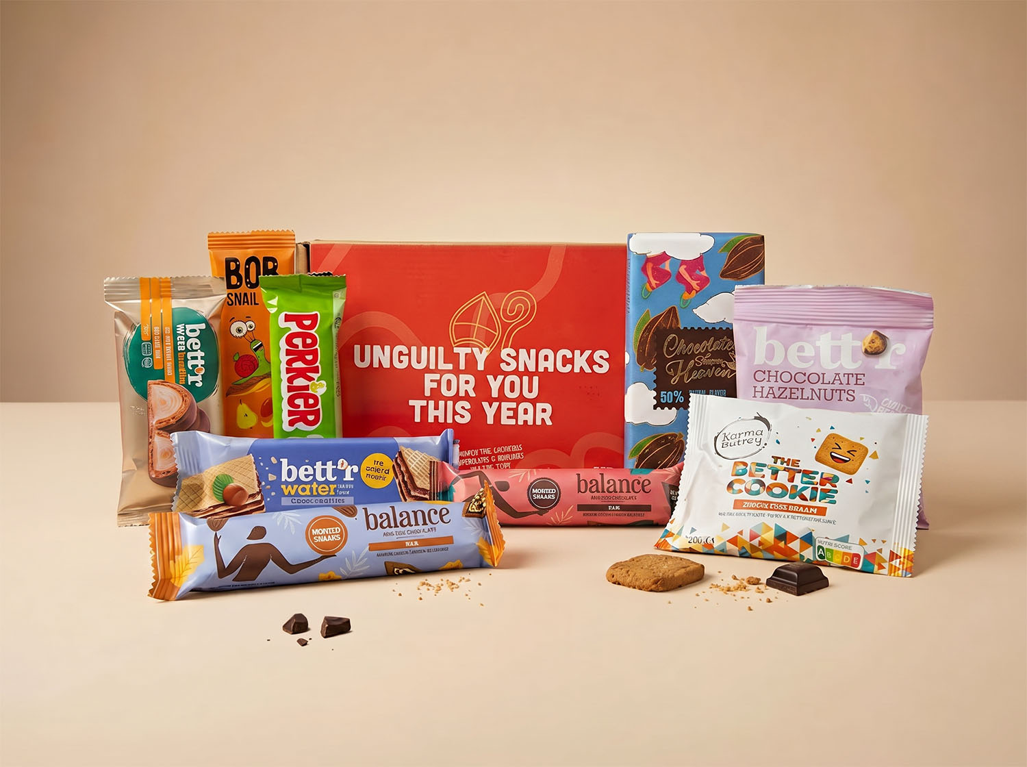Een uitgebreid JustBite sinterklaaspakket voor personeel vol verrassend lekkere snacks. In de feestelijke rode doos vind je een bewuste selectie van premium donkere chocolade, knapperige betere speculoos en fruitrepen. Wij maken beter snacken makkelijk en onvergetelijk tijdens de feestdagen.